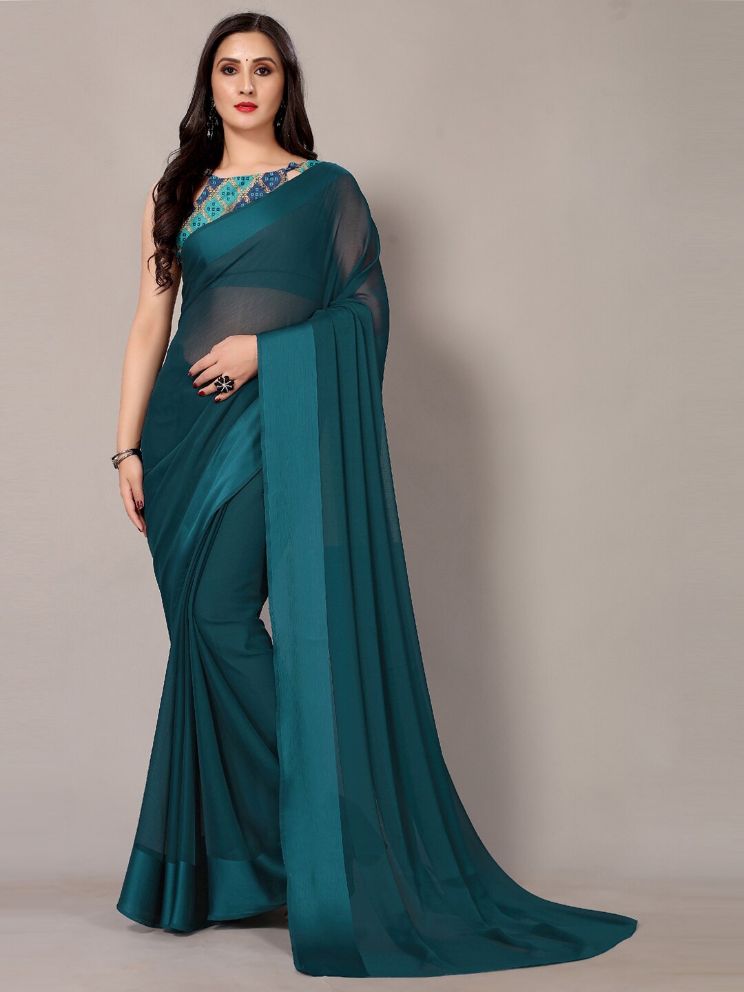 

Shaily Teal Blue Pure Chiffon Saree