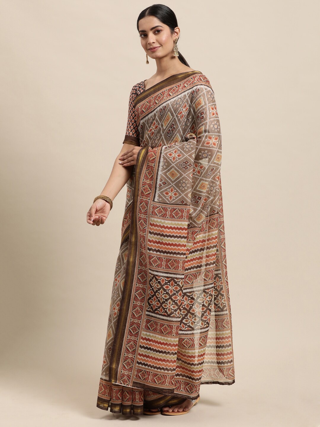 

Shaily Brown & White Bandhani Printed Zari Bandhani Saree