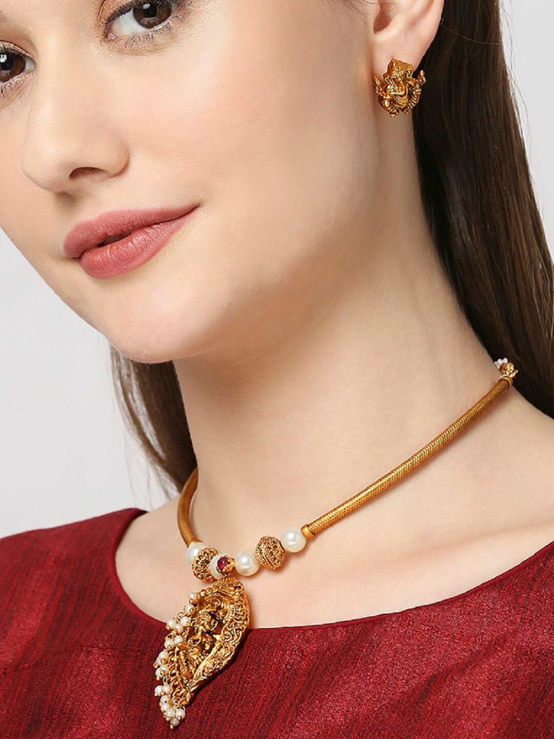 

OOMPH Gold-Plated Stone-Studded & Pearl Beaded Lord Ganesha-Motif Choker Jewellery Set