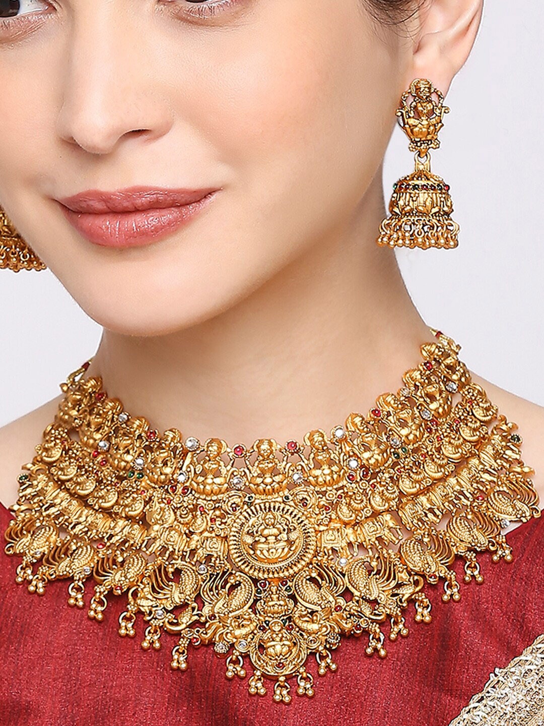 

OOMPH Gold-Plated Stone-Studded Goddess Laxmi Choker Jewellery Set