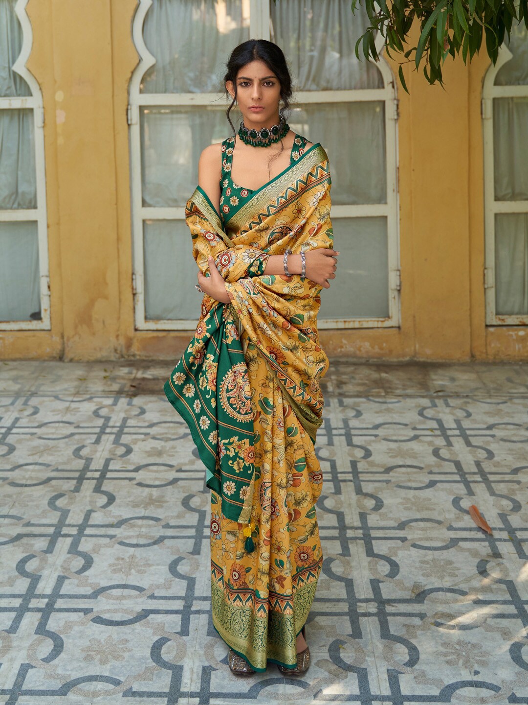

Mitera Yellow & Green Kalamkari Printed Zari Sungudi Saree