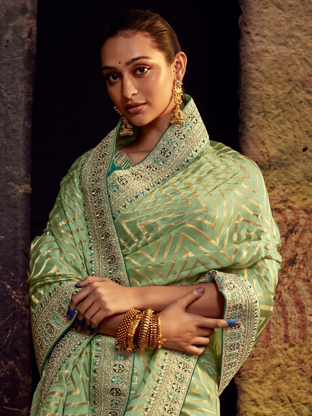 

Mitera Green & Gold-Toned Striped Embroidered Banarasi Saree