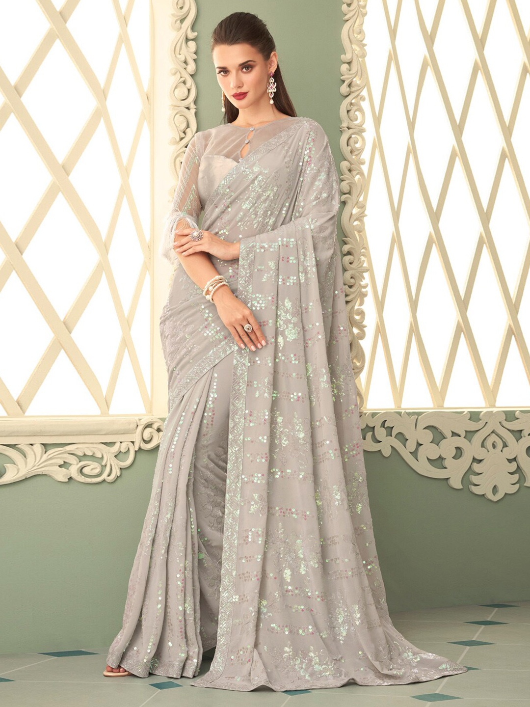 

Mitera Off White Embellished Sequinned Pure Georgette Saree