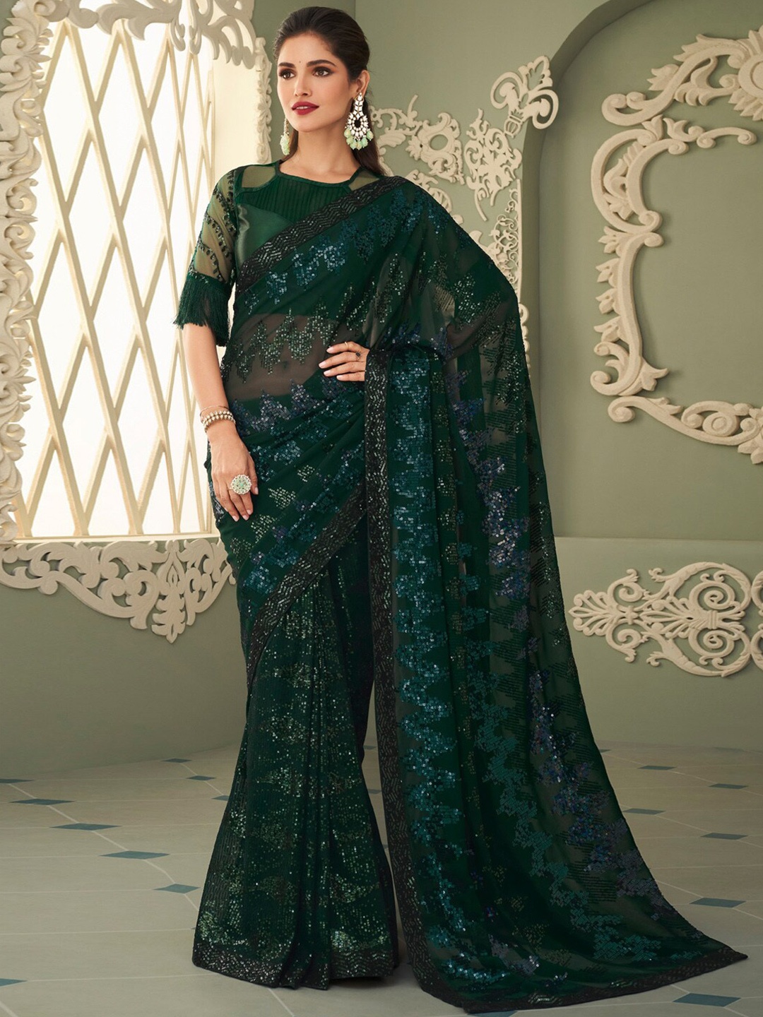 

Mitera Green Embellished Sequinned Pure Georgette Saree