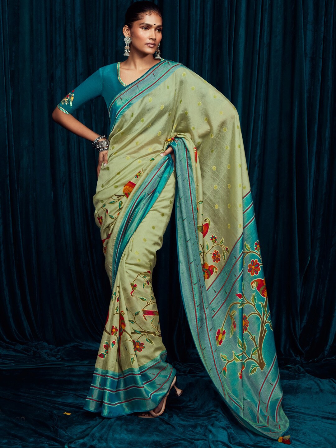 

Mitera Green & Red Ethnic Motifs Woven Design Zari Brasso Banarasi Saree