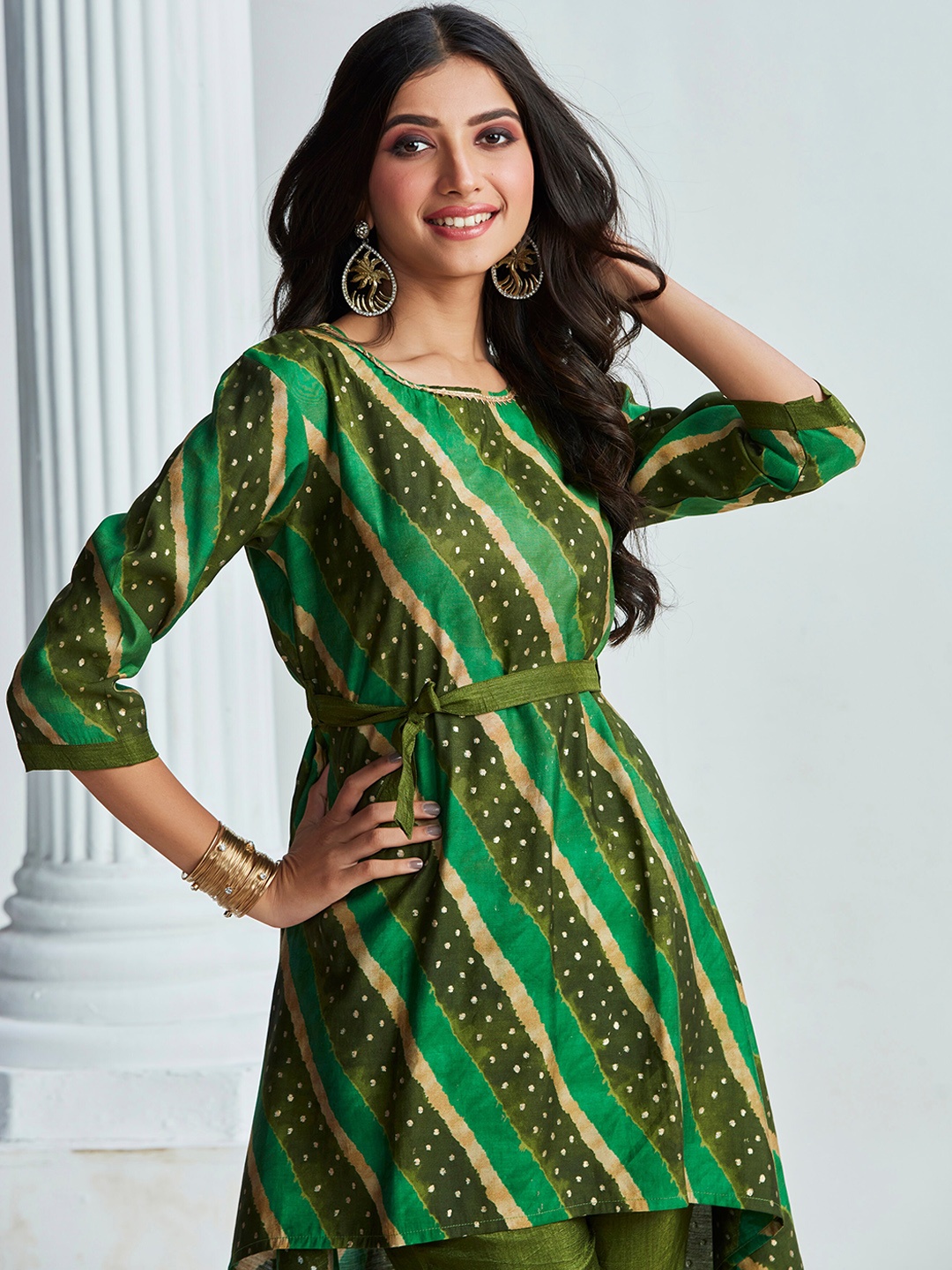 

Sangria Green Abstract Printed Gotta Patti A-Line Kurta With Trouser