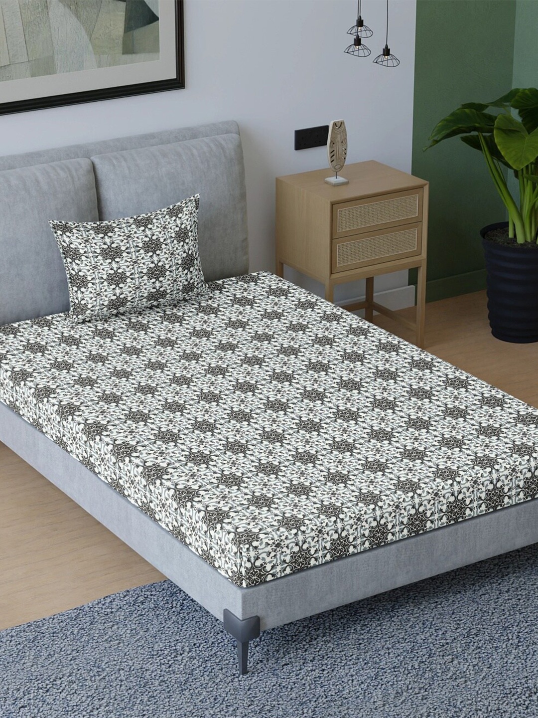

Sangria Grey Printed Cotton 200 GSM Single Bedsheet With Pillow Cover