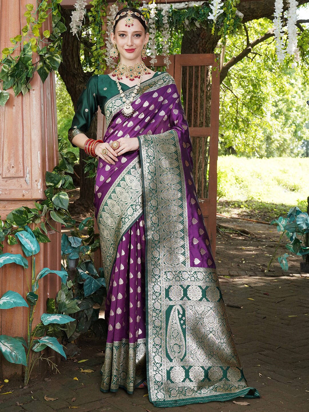 

Anouk Purple & Green Ethnic Motifs Woven Design Banarasi Saree