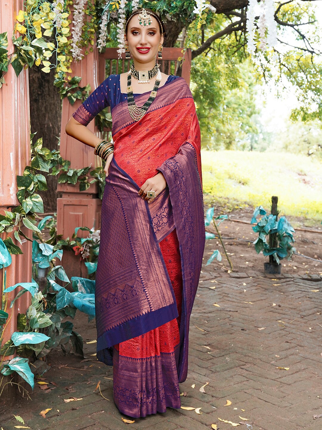 

Anouk Pink & Purple Ethnic Motifs Woven Design Zari Kanjeevaram Saree