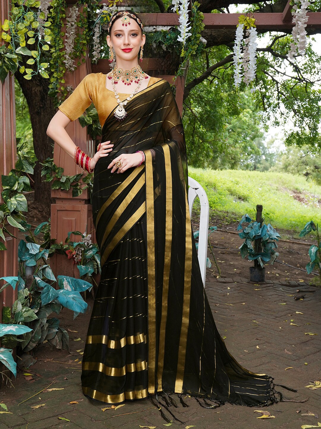 

Anouk Black & Gold-Toned Striped Zari Saree