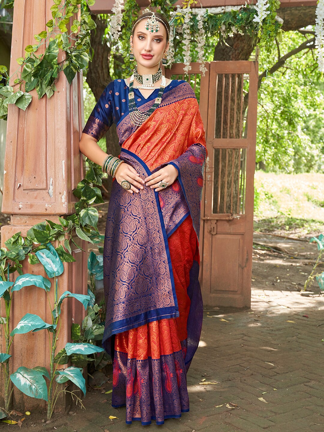 

Anouk Orange & Blue Paisley Woven Design Zari Art Silk Kanjeevaram Saree