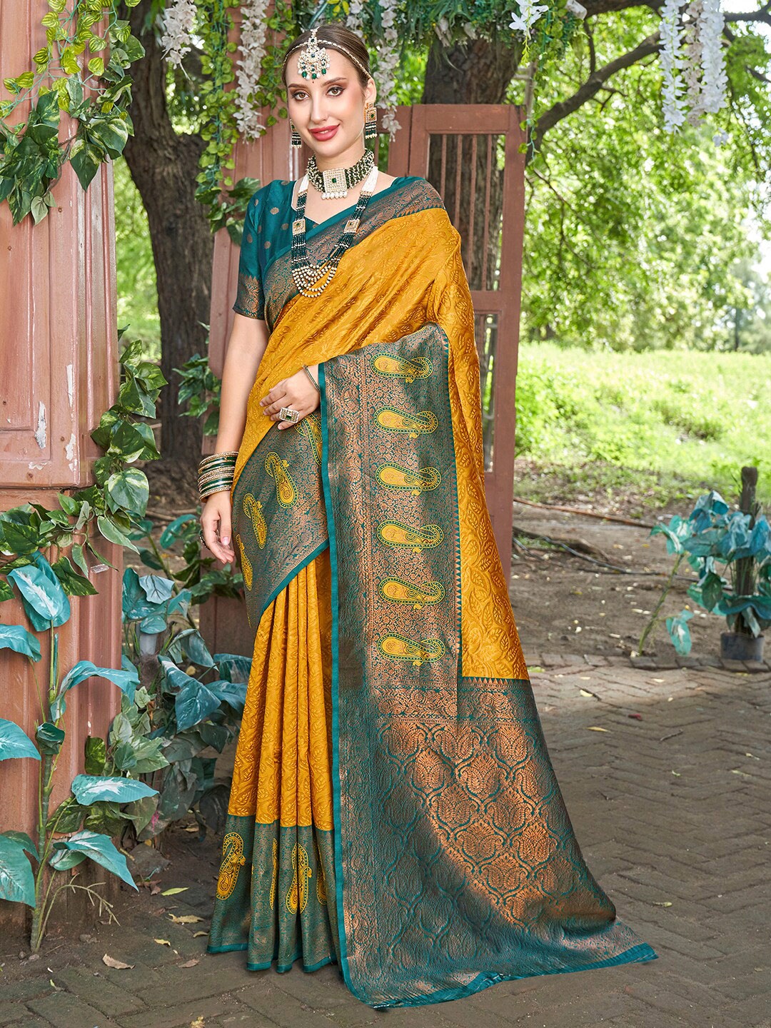 

Anouk Yellow & Green Paisley Woven Design Zari Art Silk Kanjeevaram Saree