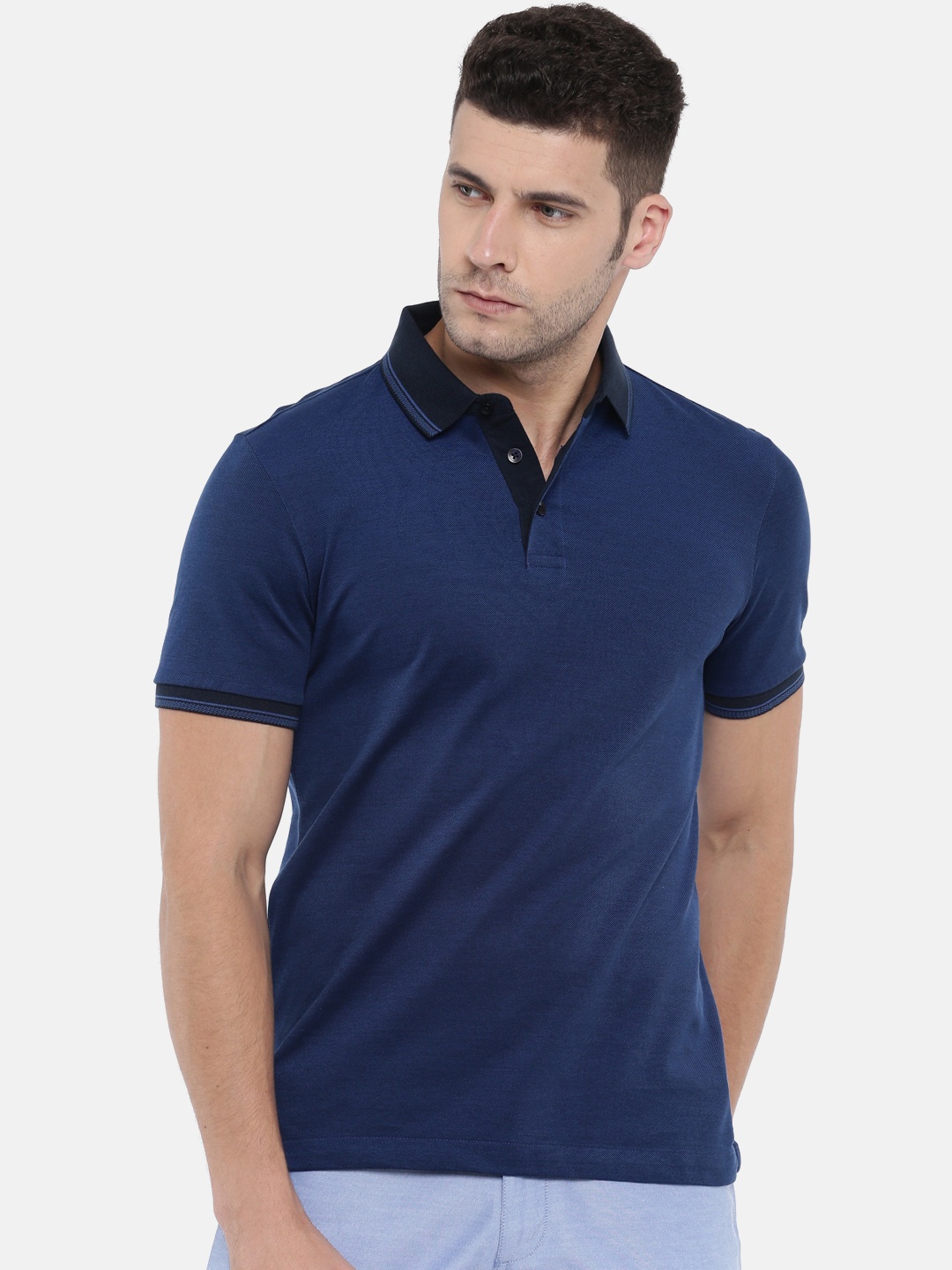 

Arrow Sport Men Blue Solid Polo Collar T-shirt