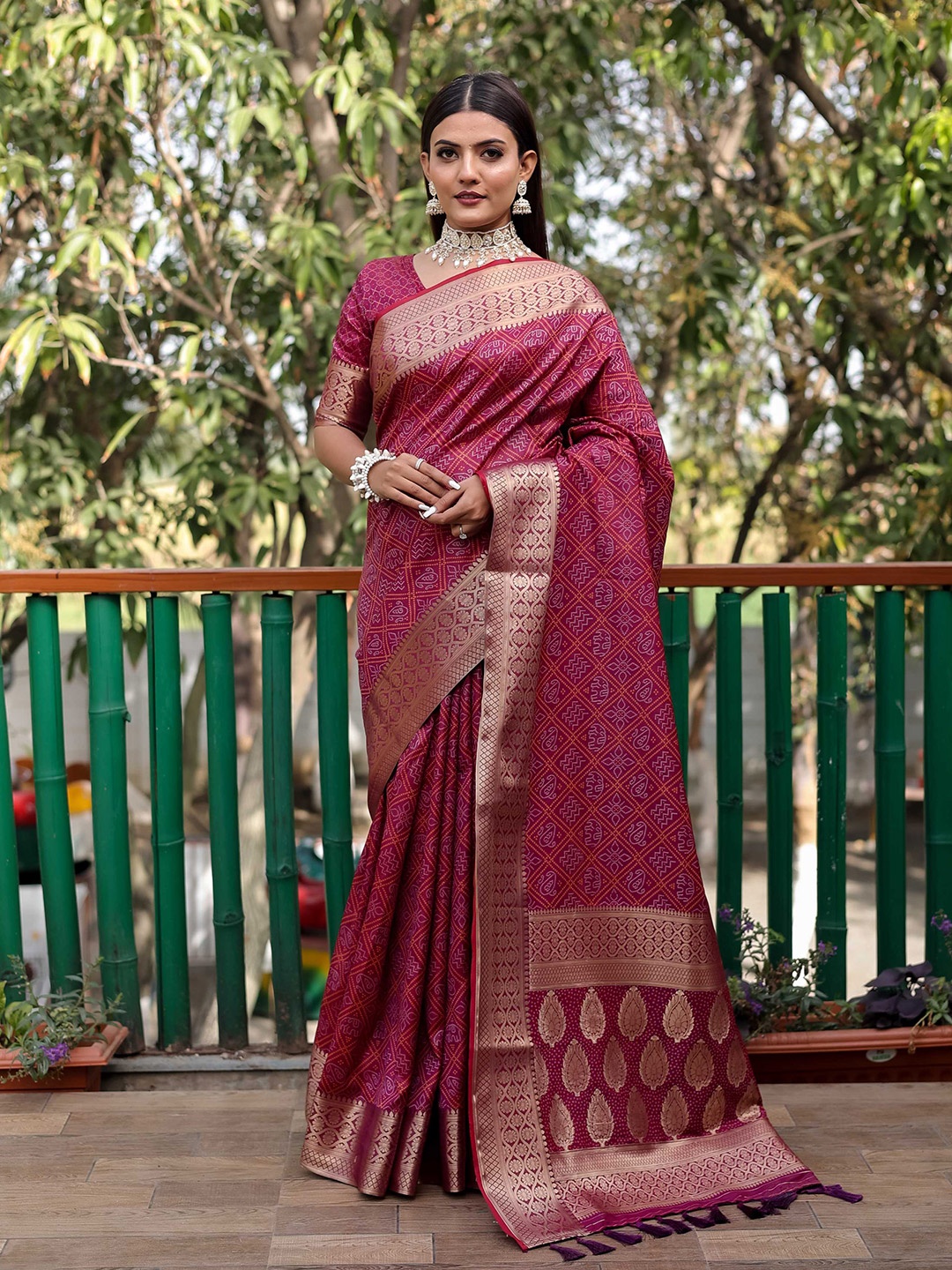 

Mitera Purple & White Bandhani Printed Zari Patola Saree