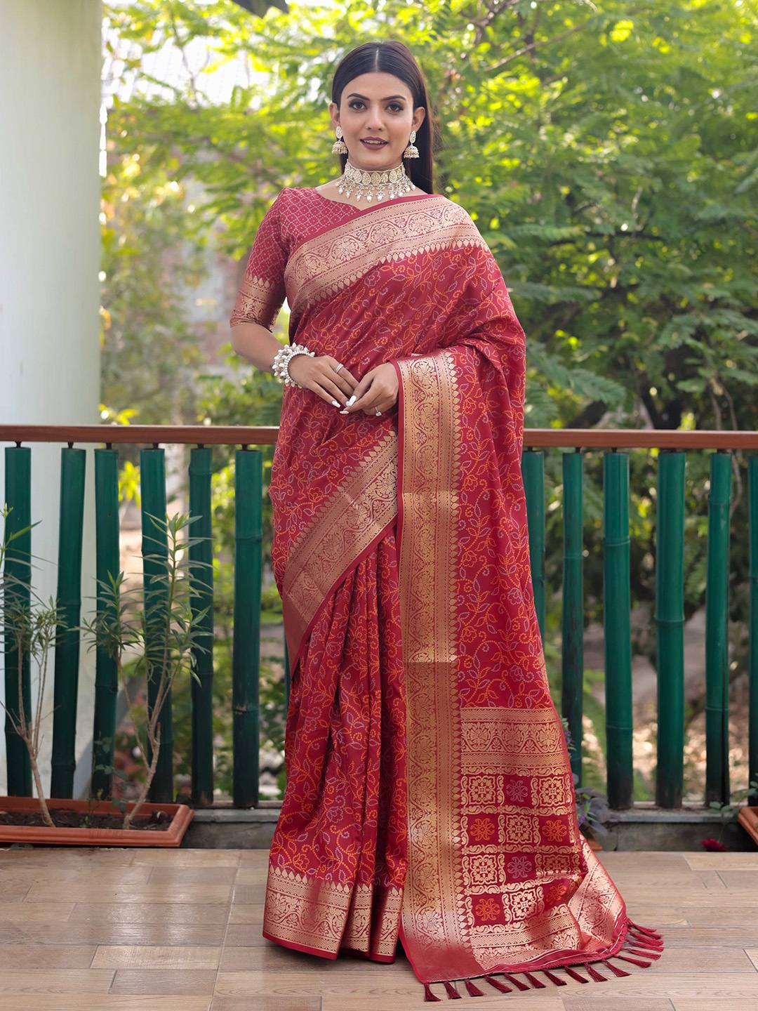 

Mitera Red & Gold-Toned Bandhani Printed Zari Patola Saree