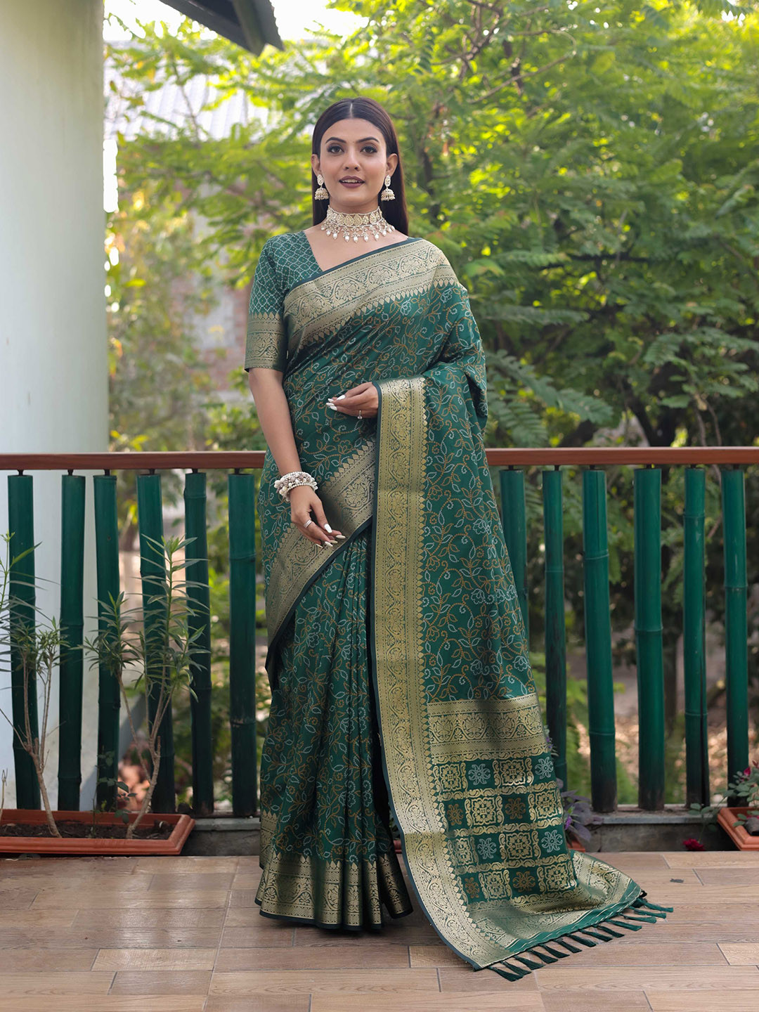 

Mitera Green & White Bandhani Printed Zari Patola Saree