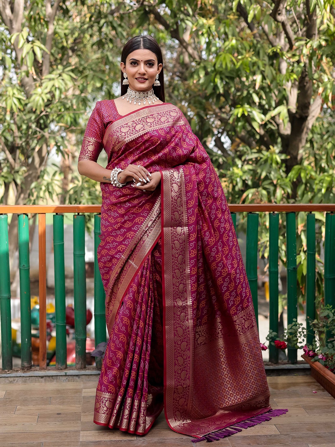 

Mitera Purple & White Bandhani Printed Zari Patola Saree