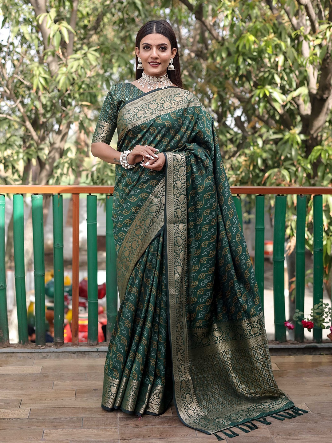 

Mitera Green & Gold-Toned Bandhani Printed Zari Patola Saree