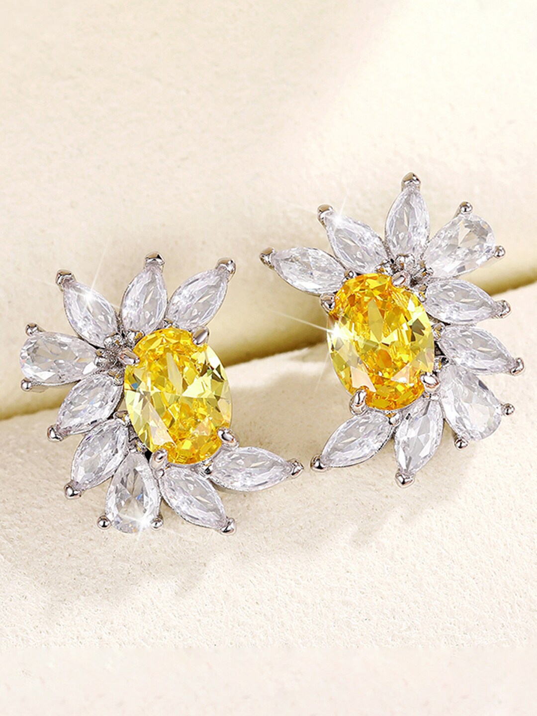 

Jewels Galaxy Silver-Plated American Diamond-Studded Studs Earrings, Yellow