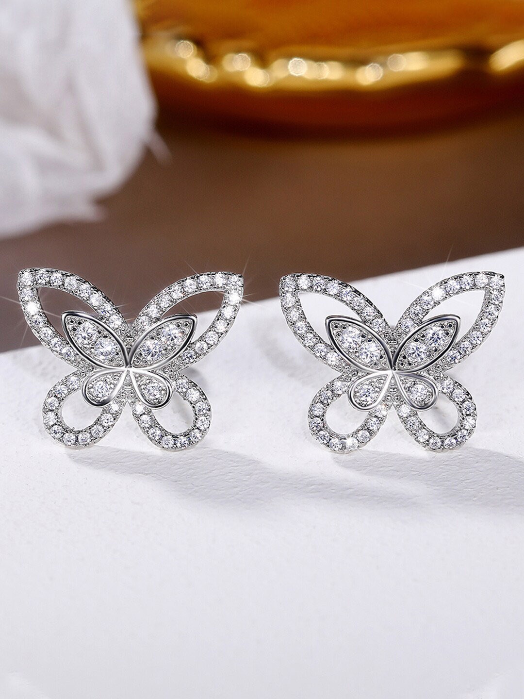 

Jewels Galaxy Silver-Plated Animal Shaped Studs Earrings