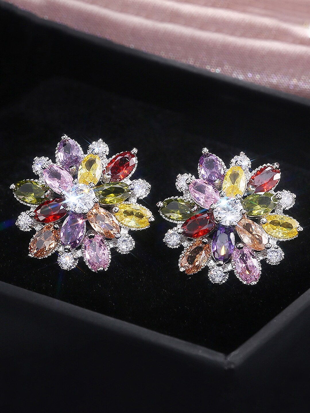 

Jewels Galaxy Silver Plated American Diamond Studded Floral Studs Earrings