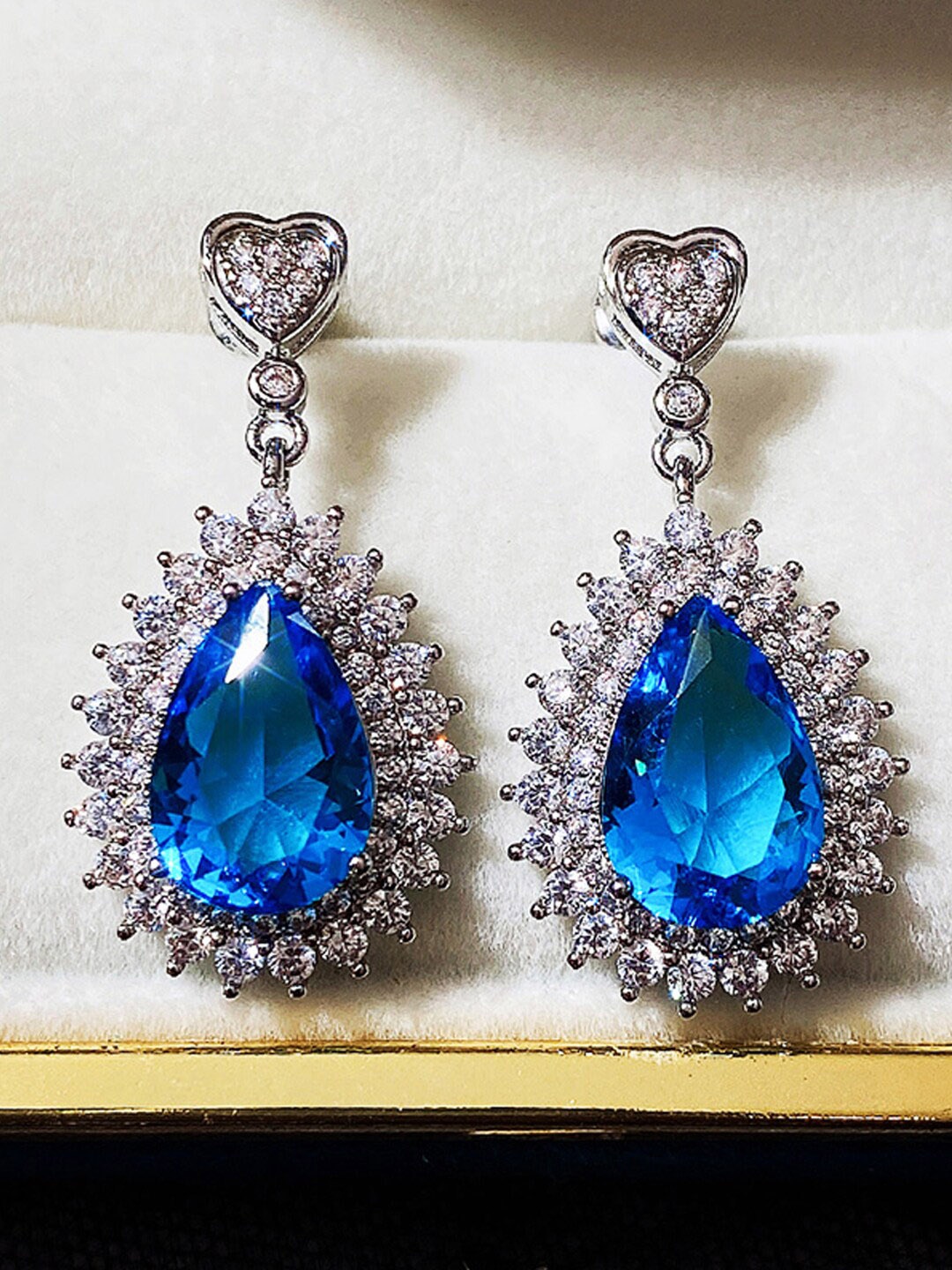 

Jewels Galaxy Blue Teardrop Shaped Drop Earrings