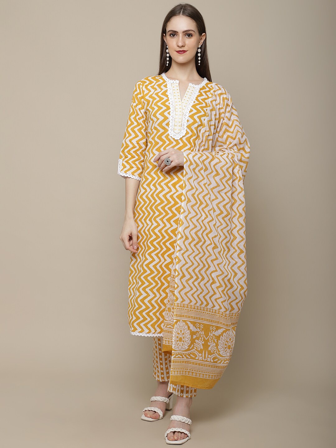 

Vastramyaa Printed Regular Thread Work Pure Cotton Kurta with Trousers & With Dupatta, Yellow