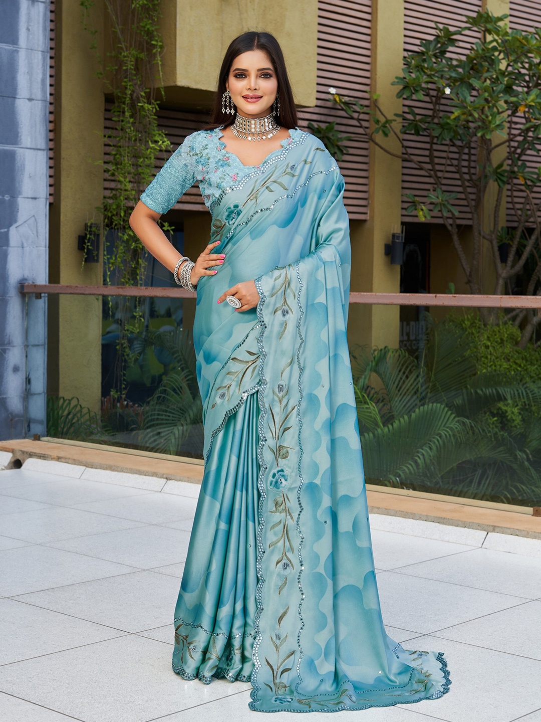 

Mitera Blue & Green Floral Printed Embellished Pure Georgette Saree