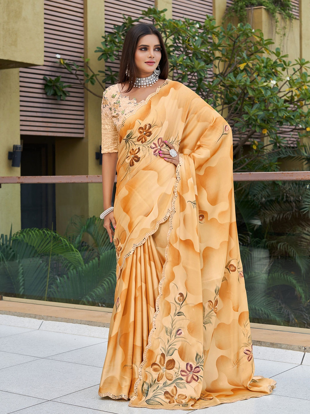

Mitera Orange Floral Printed Mirror Work Pure Georgette Saree