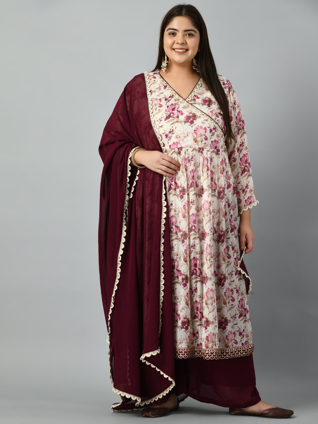 

PrettyPlus by Desinoor.com Plus Size Floral Printed Anarkali Kurta with Sharara & Dupatta, Maroon
