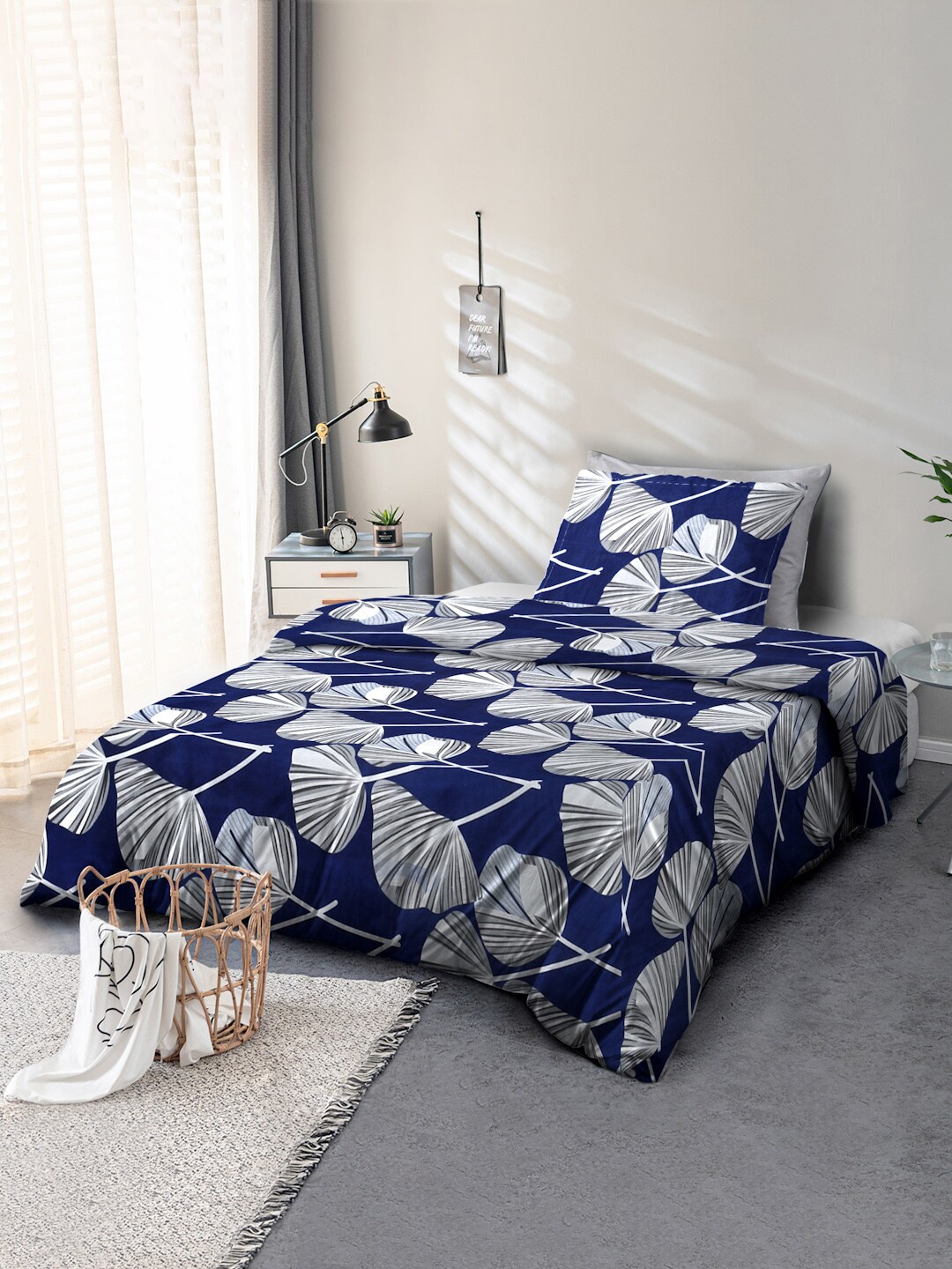 

Cortina Navy Blue & White Floral 110 TC Single Bedsheet with 1 Pillow Cover