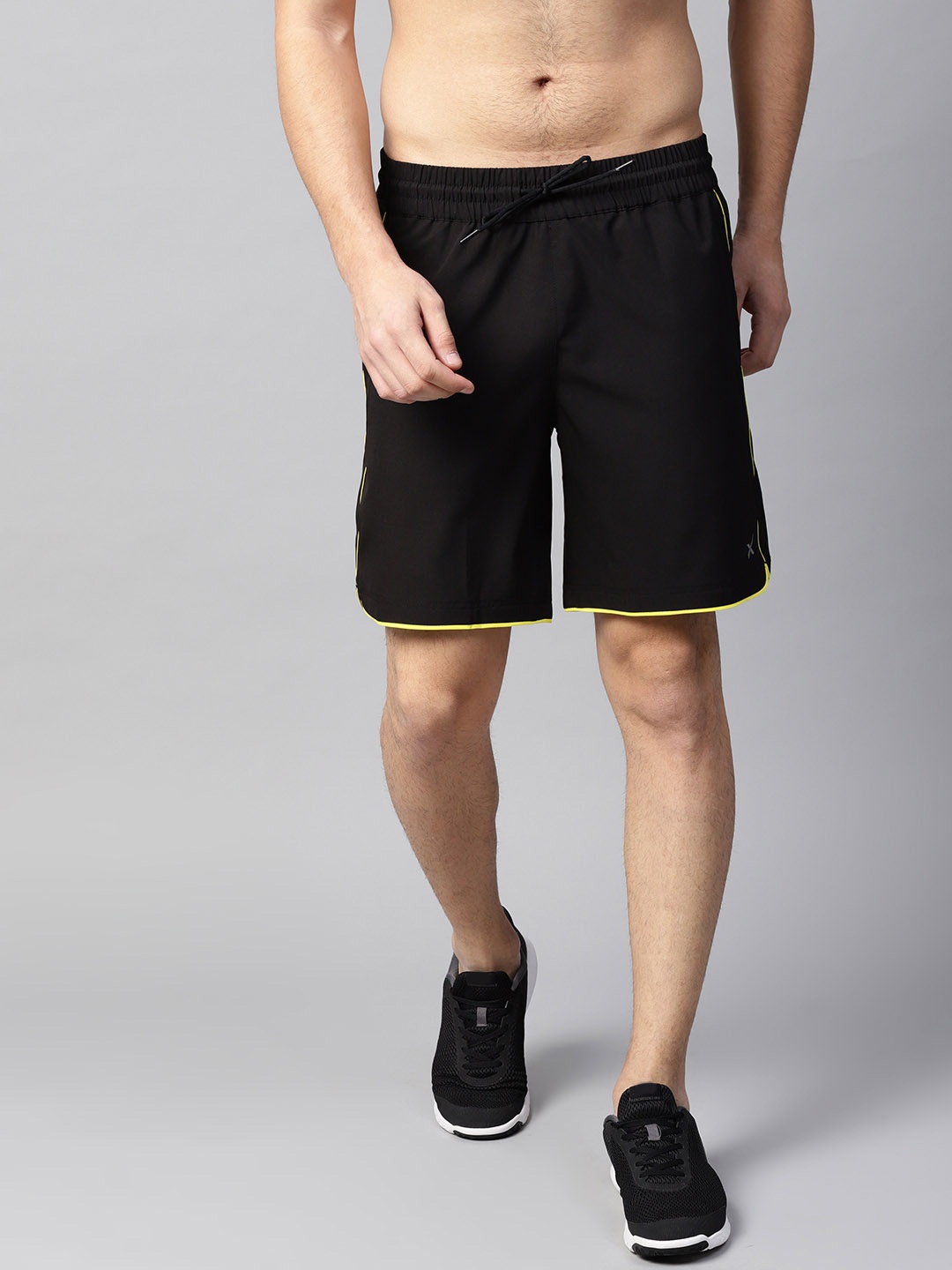 

HRX by Hrithik Roshan Men Black Solid Regular Fit Sports Shorts