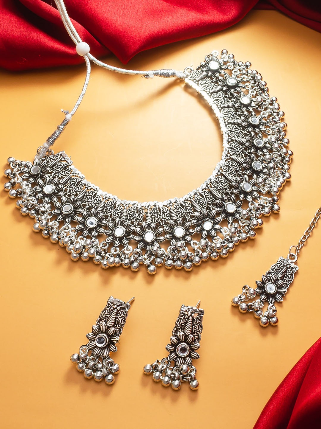 

aadita Silver-Plated Stones Studded & Beaded Jewellery Set