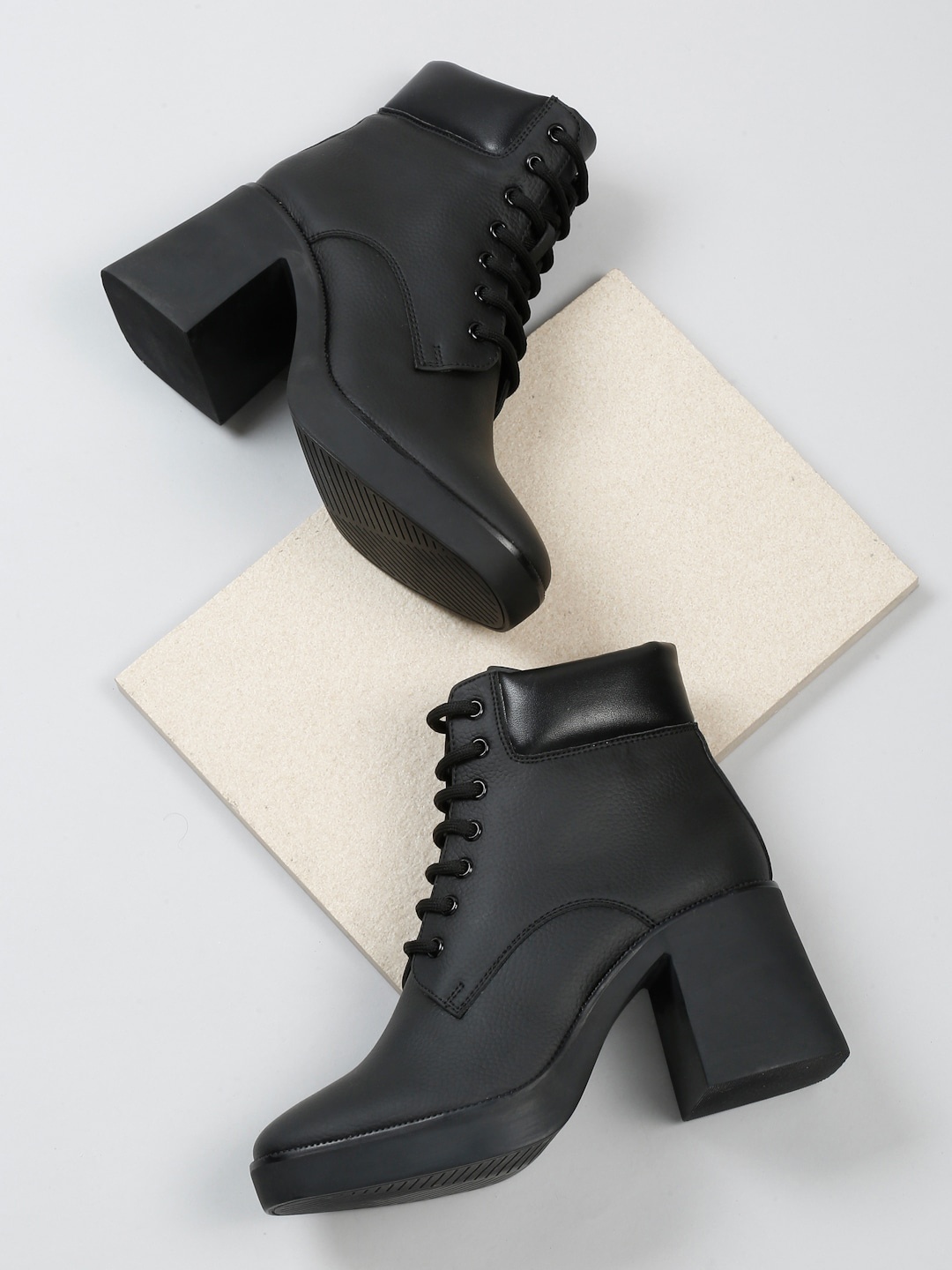 

Bruno Manetti Women Textured Heeled Mid-Top Chunky Boots, Black