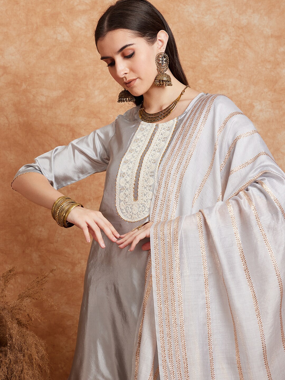 

Sangria Grey Ethnic Motifs Embroidered Straight Kurta Set