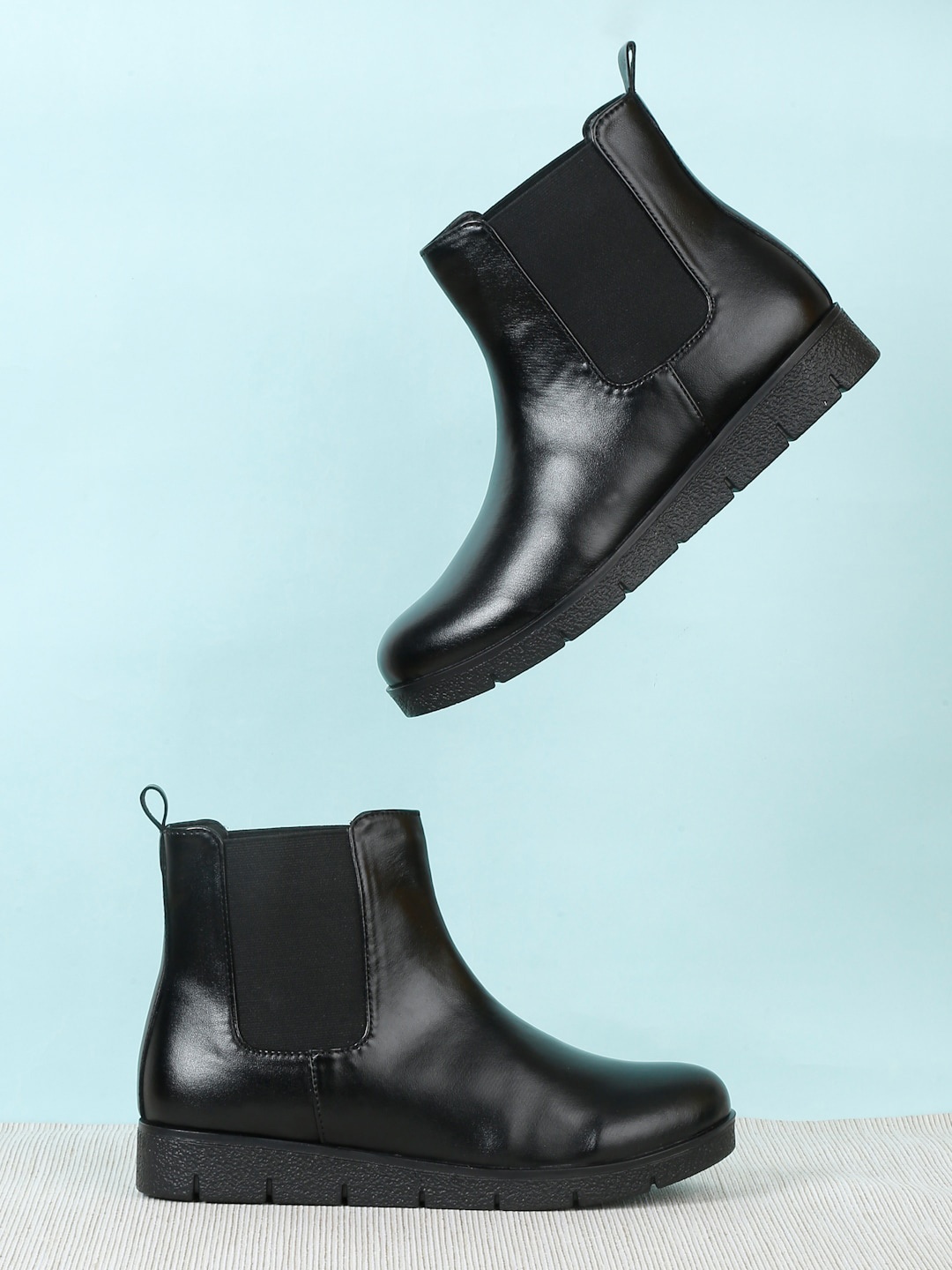 

Bruno Manetti Women Mid-Top Platform-Heeled Chelsea Boots, Black