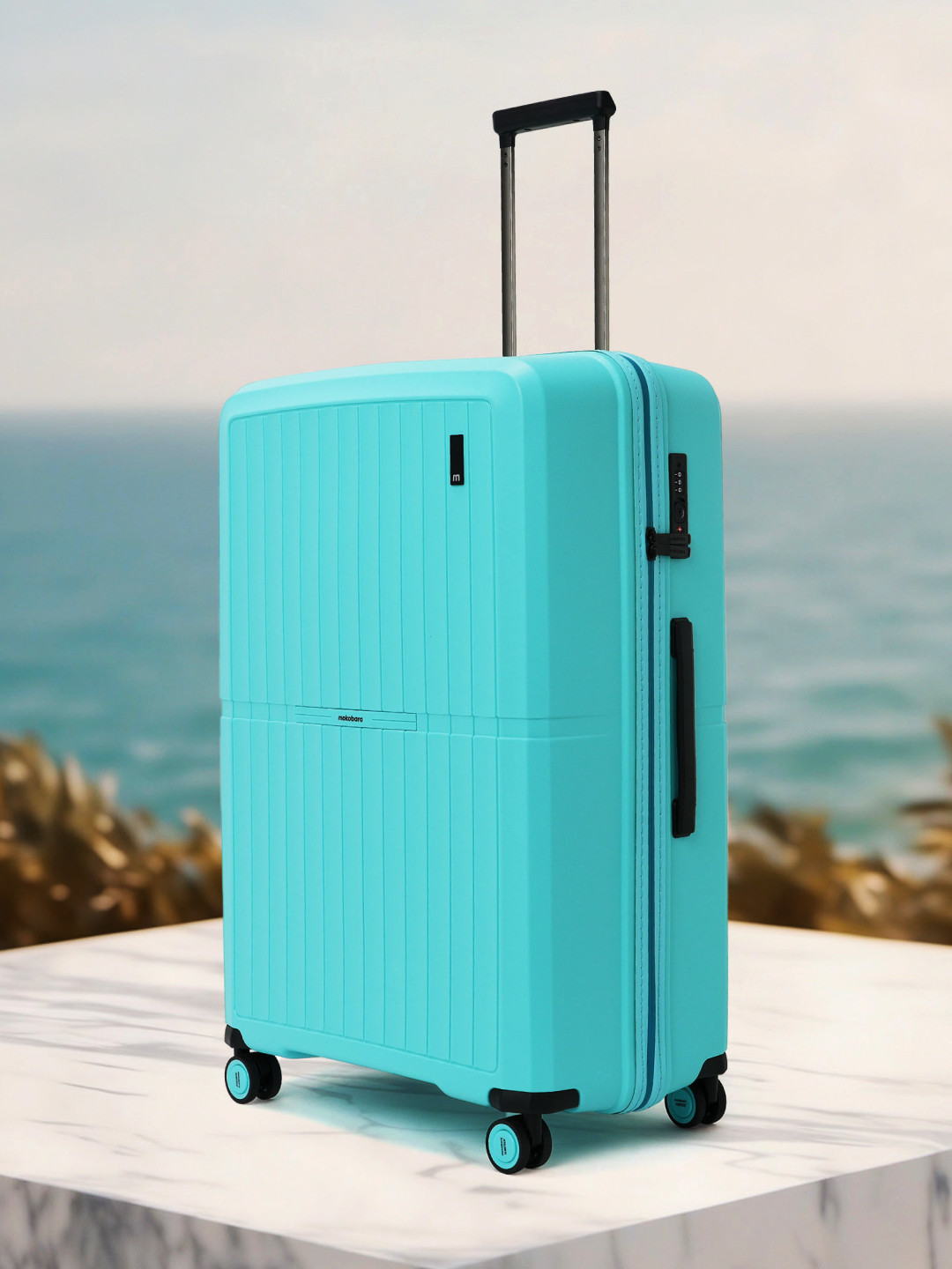 

MOKOBARA The Aviator Textured Hard-Sided Large Trolley Bag 125.30 L, Turquoise blue