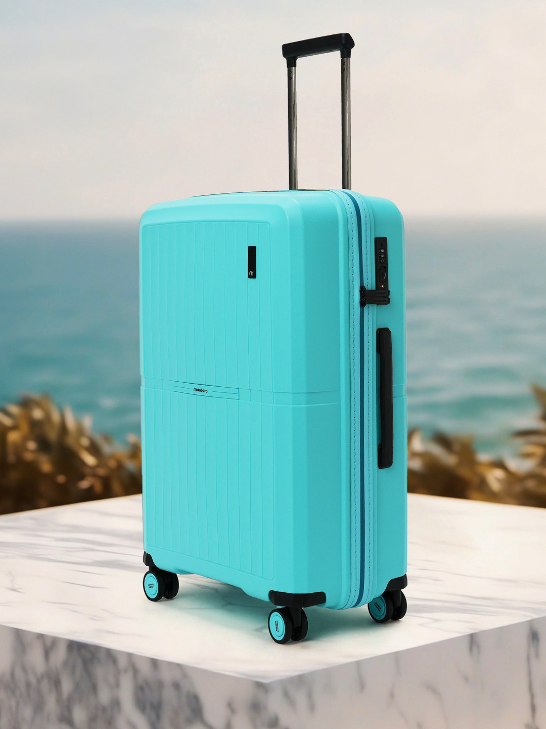 

MOKOBARA The Aviator Medium Textured Hard Trolley Bag - 65 L, Blue