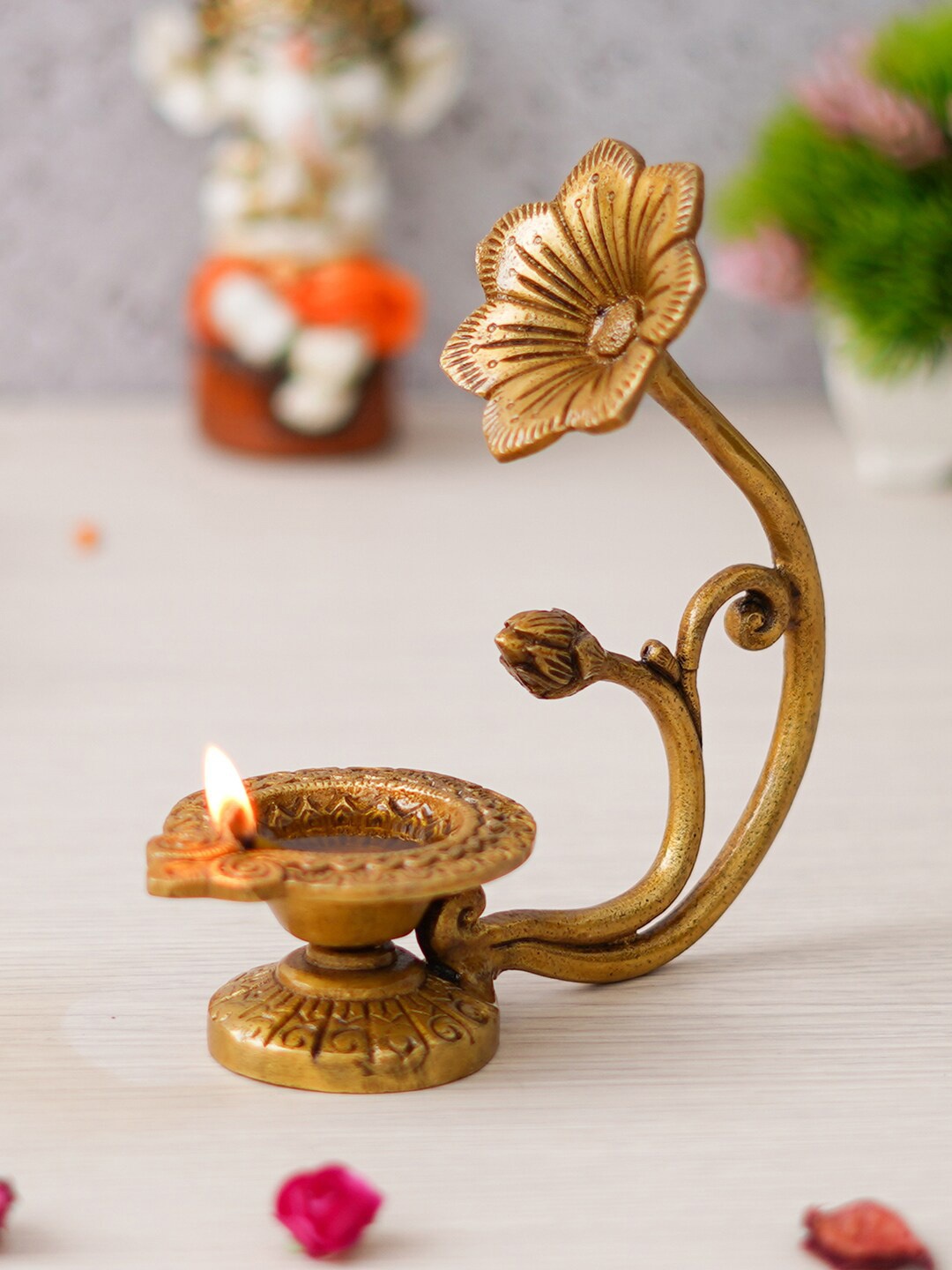

eCraftIndia Gold Toned Flower Shaped Brass Diya With Floral Handle