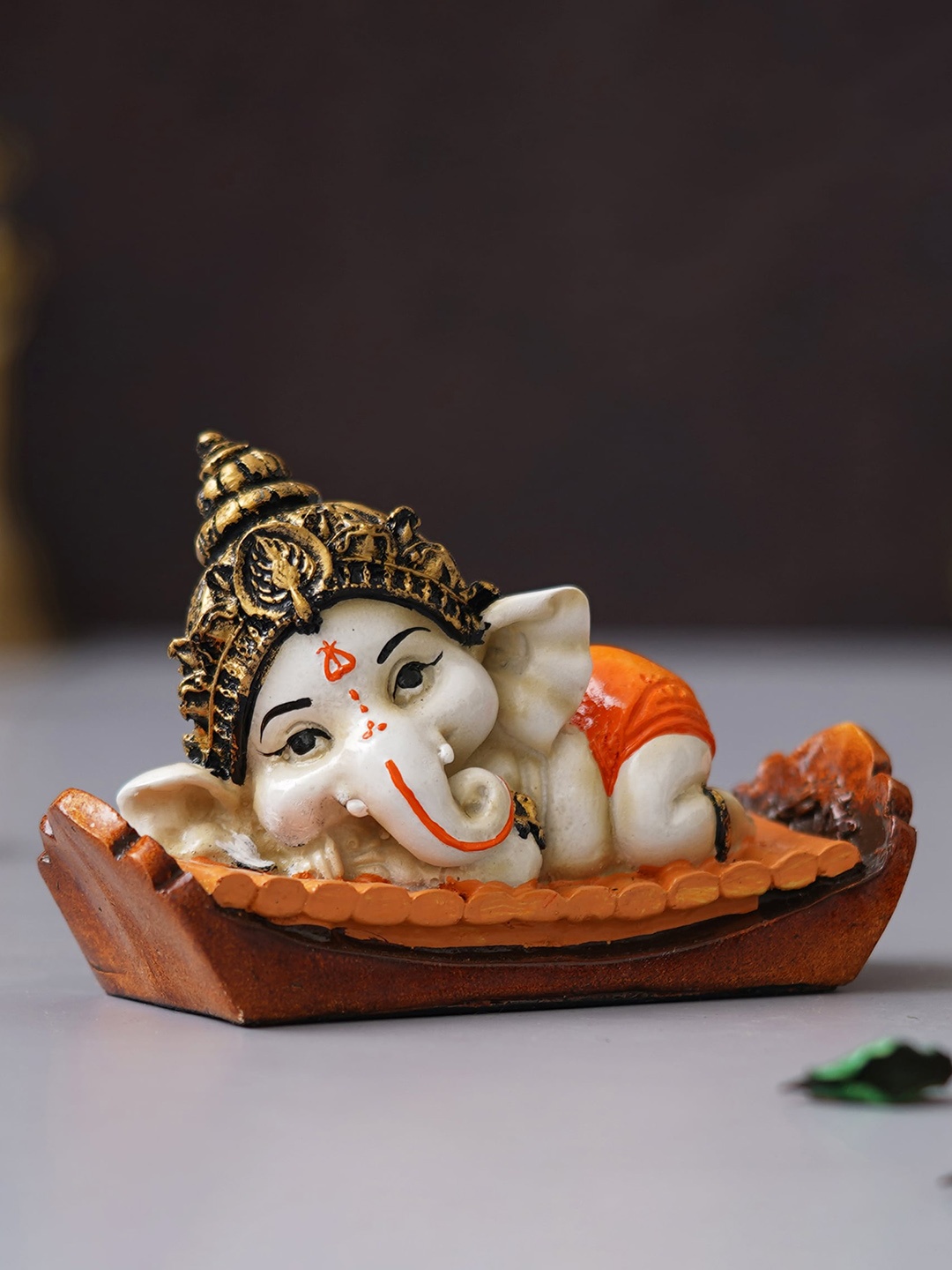 

eCraftIndia Orange & White Lord Ganesha Idol Sitting Showpiece