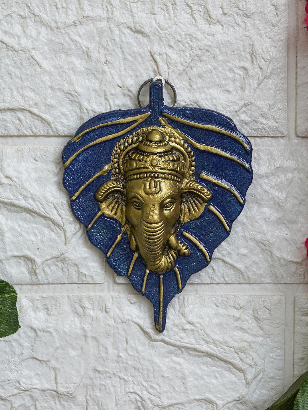 

eCraftIndia Blue & Golden Lord Ganesha Face On Peepal Leaf Wall Hanging, Gold