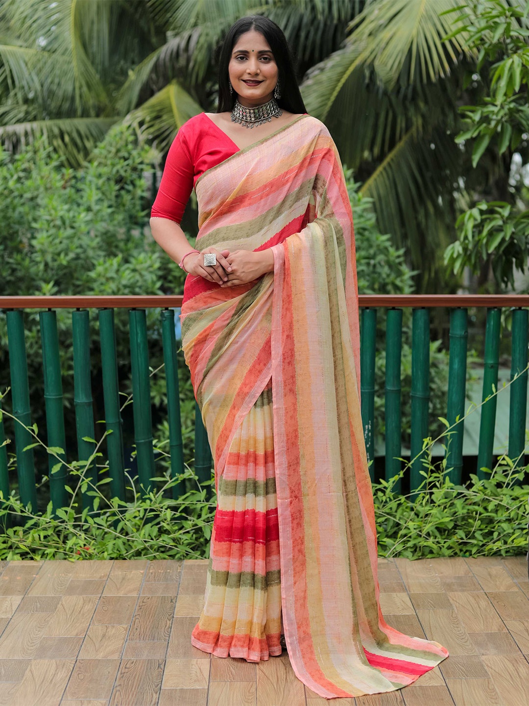 

Mitera Red & Pink Striped Chiffon Saree