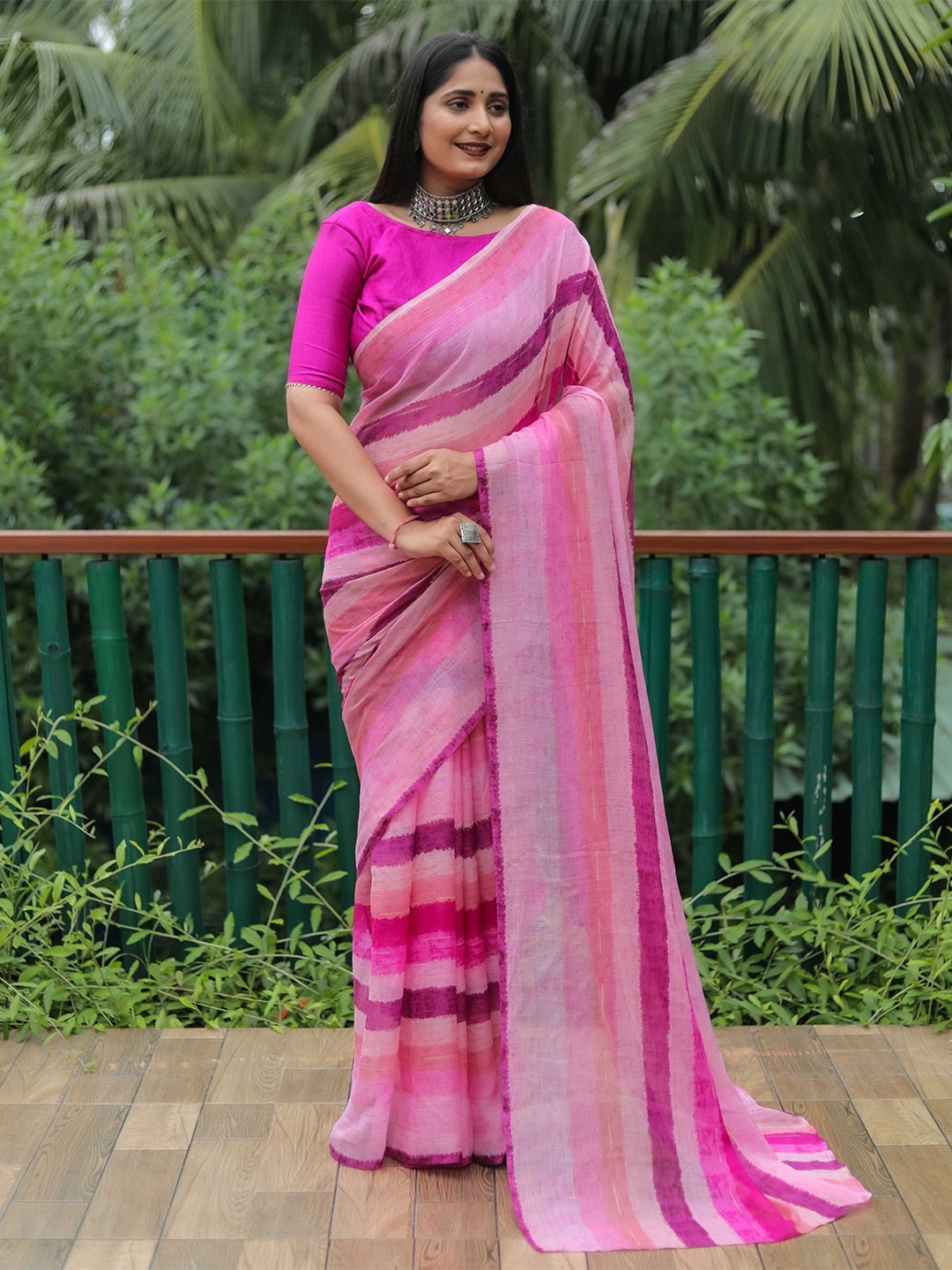 

Mitera Pink & Purple Striped Saree