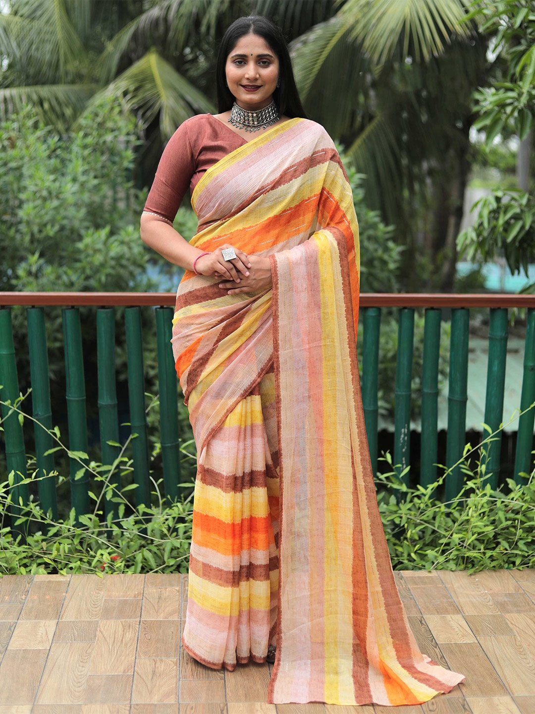 

Mitera Brown & Yellow Striped Saree