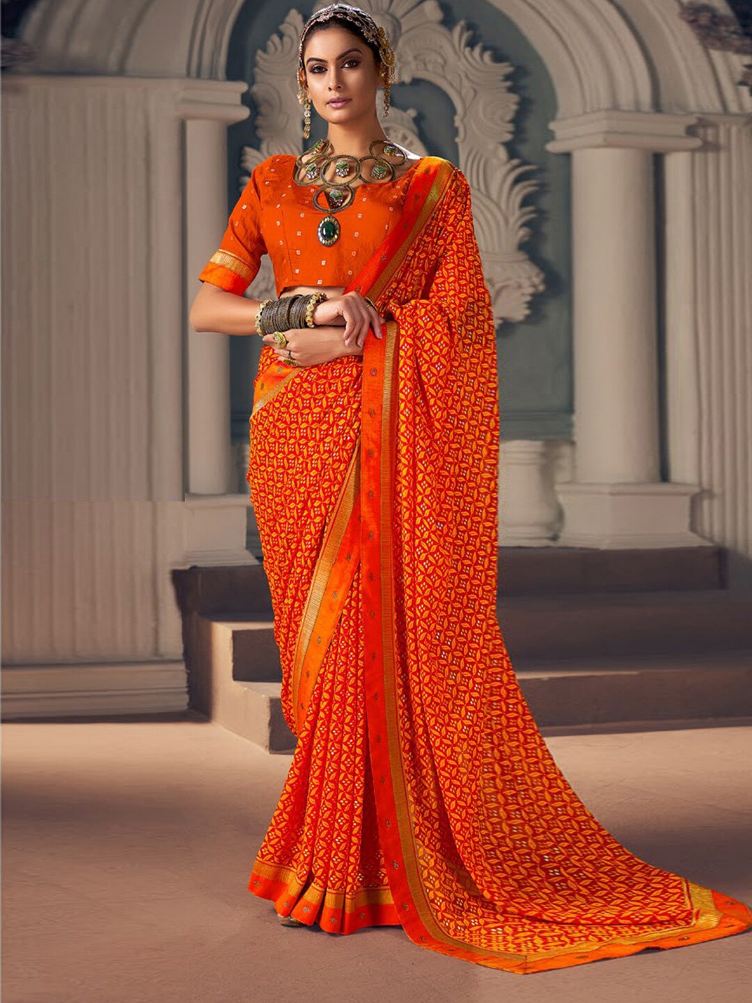 

Anouk Orange & Gold-Toned Ethnic Motifs Printed Beads & Stones Bagru Saree