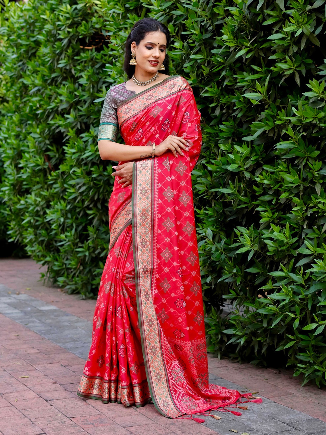 

Mitera Pink & Green Ethnic Motifs Woven Design Zari Patola Saree