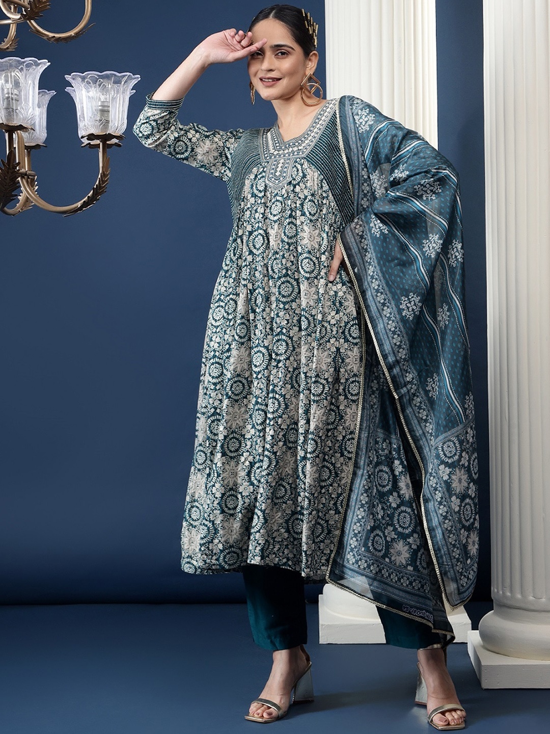 

Bani Women Floral Printed Thread Work Empire Kurta With Trousers & Dupatta, Teal