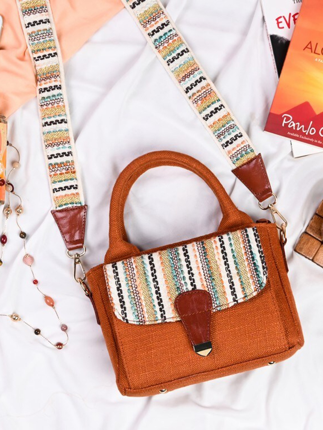 

Visual Echoes Rust Geometric Printed Structured Handheld Bag