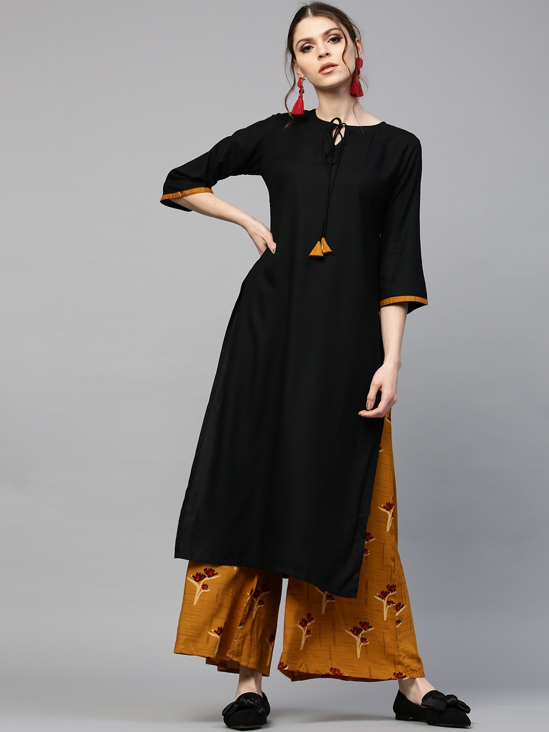 

GERUA Women Black & Mustard Brown Solid Kurta with Palazzos