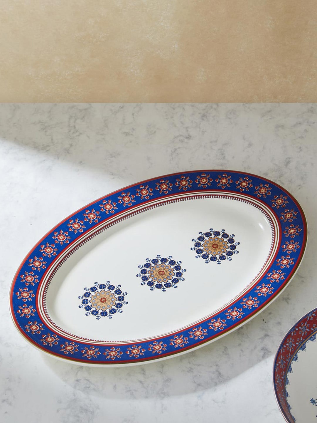 

Fabindia Falak Whit & Blue Printed Small Ceramic Oval Platter, White